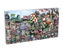 Colorful canvas artwork showing a bustling urban streetscape depicted in a detailed, cartoonish style with vibrant shop fronts and street signs.