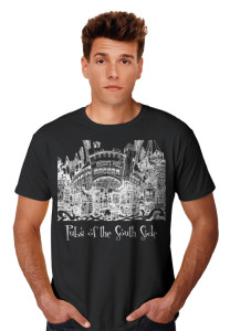 A young man wearing a black t-shirt with a white graphic of buildings and the text "pubsOf Downtown Chicago" printed on it.