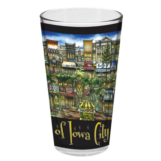 A colorful souvenir cup featuring an artistic portrayal of Lawrence, KS landmarks and street scenes, with the text "of Lawrence, KS" at the bottom.