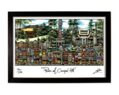 Framed artwork titled "pubsOf Chapel Hill, NC" depicting a colorful, detailed illustration of various pubs and buildings with unique architecture, signed by the artist.