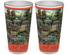 Two matching mugs featuring a colorful, detailed illustration of a fictional town labeled "pubs of Corvallis, OR," with vibrant rooftops and bustling streets.