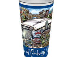 A souvenir cup decorated with colorful illustrations of dallas landmarks and the text "dallas cowboys.