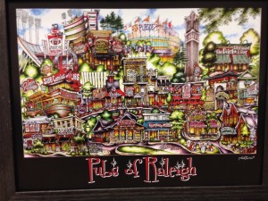 Colorful illustrated map titled "pubsOf Raleigh, NC" featuring various pubs and landmarks in Raleigh, including NC State Wolfpack venues, artistically rendered in a cartoon style.