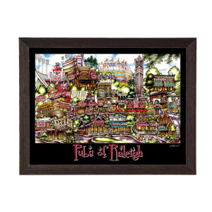 Colorful illustrated pubsOf Raleigh, NC poster in a black frame, titled "Pubs of Raleigh," depicting a vibrant, detailed scene of various bars and pubs in Raleigh, featuring NC State Wolfpack memorabilia.