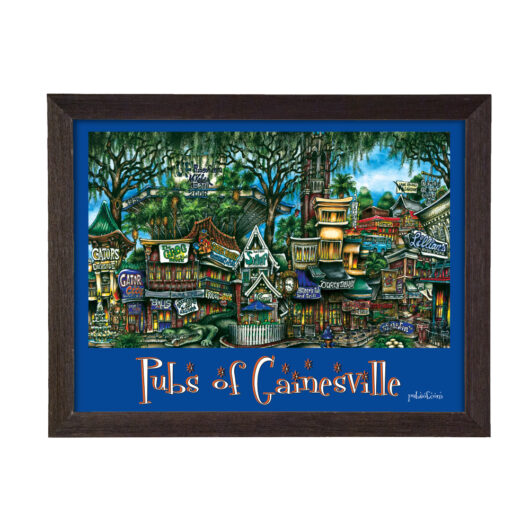 Framed painting titled "pubs of gainesville," featuring a whimsical, colorful illustration of various pub buildings surrounded by trees.
