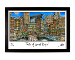Colorful framed artwork titled 'plazas of grand rapids' depicting a vibrant, bustling cityscape with buildings and a bridge.